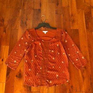 An orange blouse